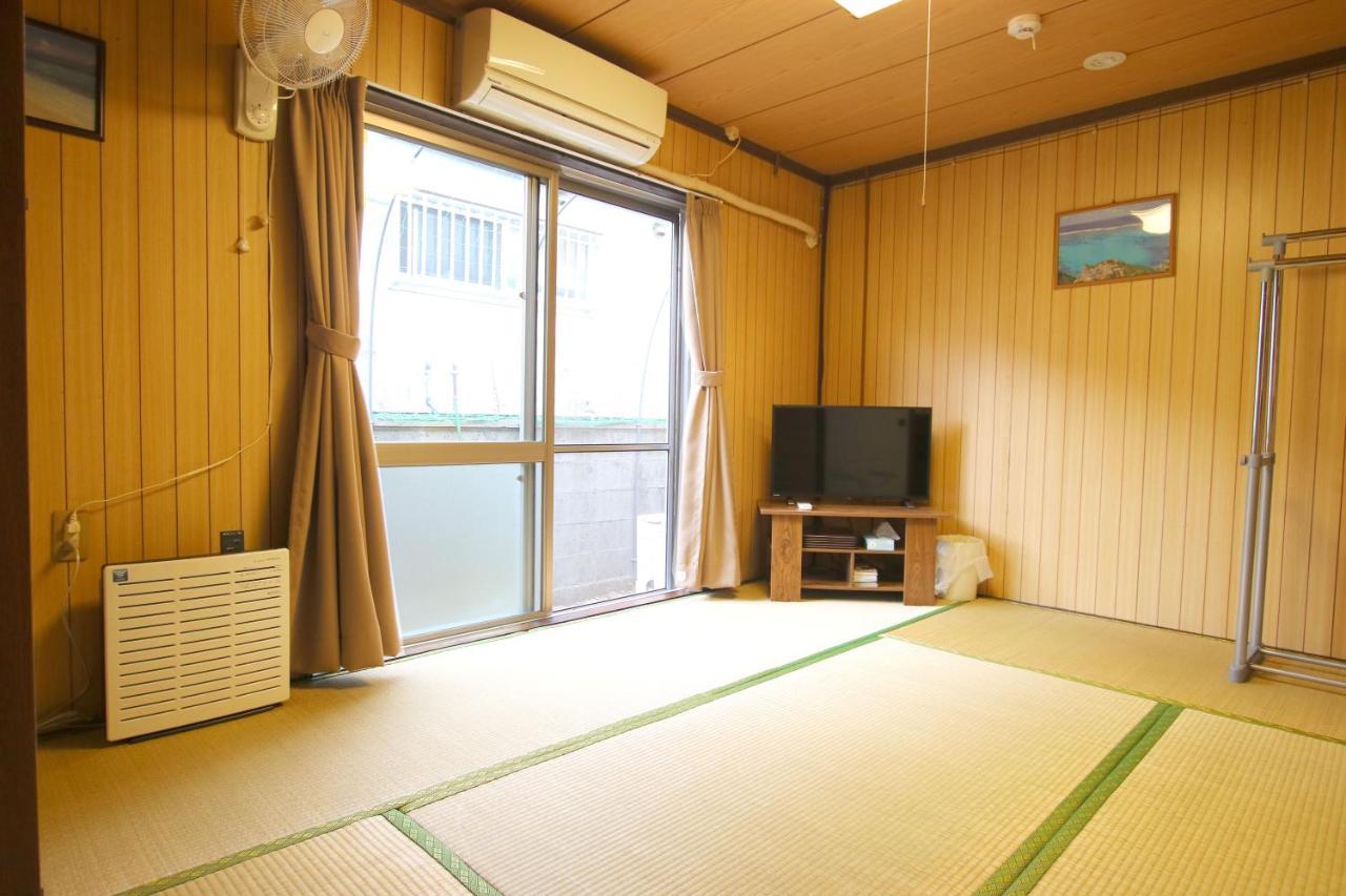 Okinawa Naha Jinjin -沖縄伝統体験型宿じんじん- Luaran gambar